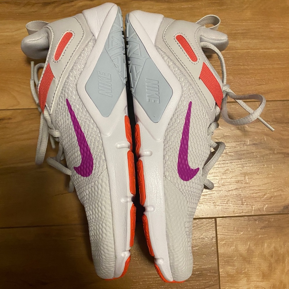 Women’s Nike Legend Essential Vast Grey Fire Facts Fit Activity Pink
